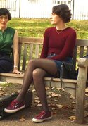 Phoebe-Waller-Bridge-in-Casual-Denim-Skirt-and-Burgundy-Sneakers-717x1024.jpg