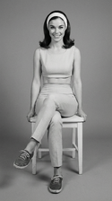 freepik__full-body-shot-sitting-a-white-chair-girlie-sassy-__86261.png