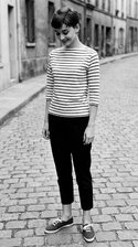 freepik__young-audrey-hepburn-wearing-navy-blue-keds-with-t__90432.png