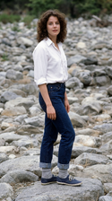 freepik__young-debra-winger-wearing-white-shirt-cuffed-jean__5234.png