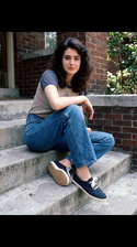 freepik__young-sean-young-wearing-img1-img2-img3-sitting-on__5204.png