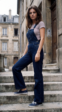 freepik__young-jacqueline-bisset-wearing-navy-keds-with-thi__5157.png