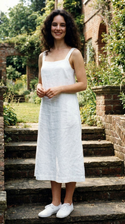 freepik__young-madeleine-stowe-wearing-white-dress-and-whit__5165.png