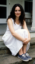 freepik__young-madeleine-stowe-wearing-white-dress-and-slig__5177.png