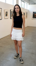 freepik__a-young-eliza-dushku-wearing-a-black-crop-top-whit__59829.png
