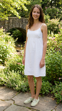 freepik__a-young-amy-acker-wearing-a-white-dress-and-shoes-__59825.png