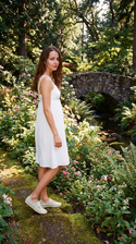 freepik__a-young-amy-acker-wearing-a-white-dress-and-shoes-__59824.png
