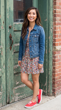 freepik__brenda-song-wearing-denim-jacket-dress-and-red-ked__69274.png