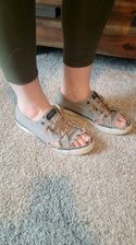 freepik__img1-shoes-are-worn-dwon-canvas-has-holes-and-rips__91388.png