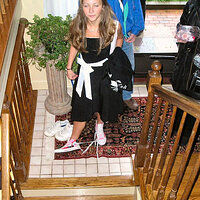 rocking the converse in her frolic dress.jpg