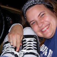 Chelly tied Jenny's shoes together...kinda hard to get outta the car Jen.JPG