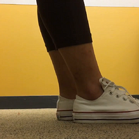 white converse under a table.mp4