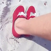 playing in the sand with my keds at the beach.mp4