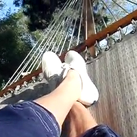 trashed white keds champs in hammock.mp4