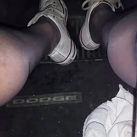 Driving white Converse tennis shoes black nylon.mp4