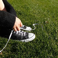 sam removing converse sneakers.mp4