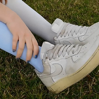 jessica taking off her dirty white sneakers.mp4