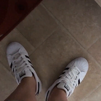 her adidas superstars shoeplay in forest.mp4