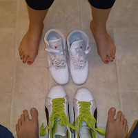 she and he playing with grapes - reebok and pumas.mp4