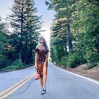 black-and-orange-floral-dress-with-puff-sleeves-love-maegan-in-the-road-1320x1400.jpg