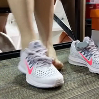 Trying On New Adidas And Nike Sneakers In A Shop.mp4