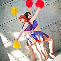 Kim Possible and Bonnie Rockwaller in their cheerleader outfits from Kim Possible.jpg