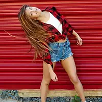 beautiful-girl-having-fun-dancing-waving-hair-outdoor-b_002.webp