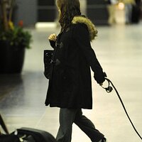 27792_Tikipeter_Natalie_Portman_departs_JFK_Airport_006_123_565lo.jpg