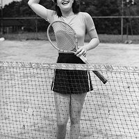 woman-at-tennis-court-george-marks.jpg