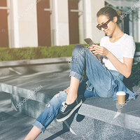 depositphotos_198460944-stock-photo-a-woman-sits-on-the.jpg