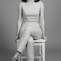 freepik__full-body-shot-sitting-a-white-chair-girlie-sassy-__86261.png