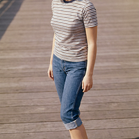 freepik__young-ann-margret-wearing-navy-keds-with-thin-sole__90440.png