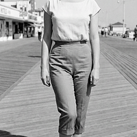 freepik__young-marilyn-monroe-wearing-black-keds-with-thin-__90435.png