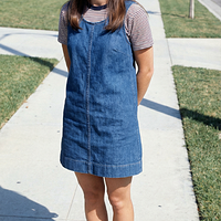freepik__young-sally-field-wearing-red-keds-with-thin-soles__90454.png