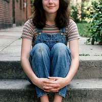 freepik__young-debra-winger-wearing-img1-img2-img3-sitting-__5208.png