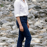 freepik__young-debra-winger-wearing-white-shirt-cuffed-jean__5234.png