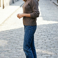 freepik__young-jacqueline-bisset-wearing-navy-keds-with-thi__5151.png