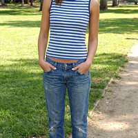freepik__a-young-jessica-alba-wearing-a-striped-sleeveless-__59835.png