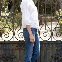 freepik__a-young-amy-acker-wearing-white-blouse-with-puff-s__59822.png