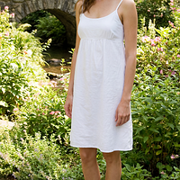 freepik__a-young-amy-acker-wearing-a-white-dress-and-shoes-__59825.png